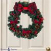 Evergreen Tartan Bow Wreath on door